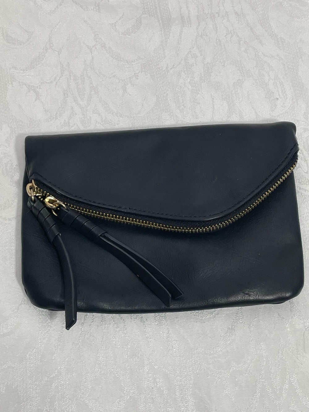 Street Level Black Vegan Leather Fold-Over Clutch with Gold Zip Accent.